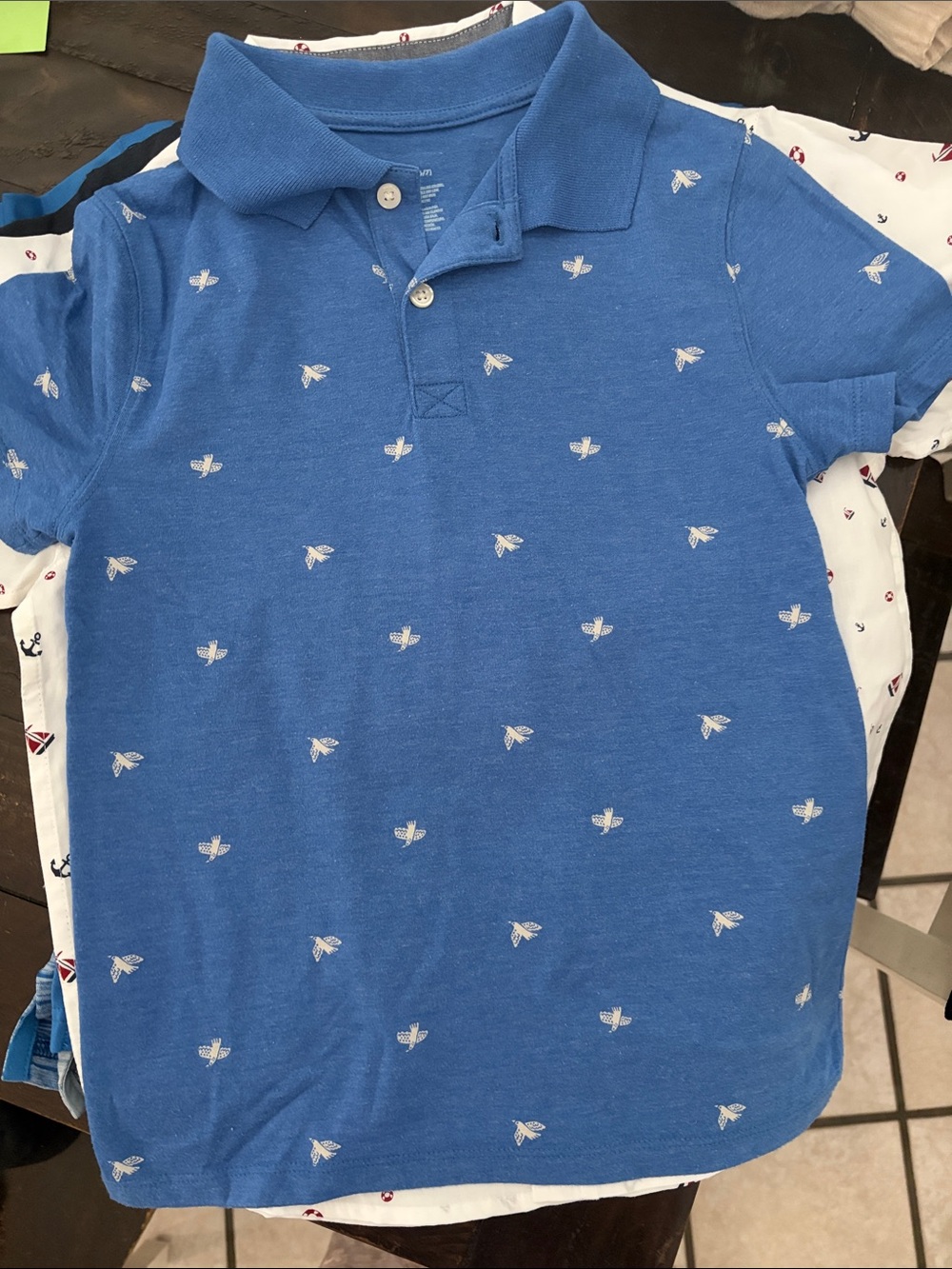 Six collared shirts in size 6 and 7